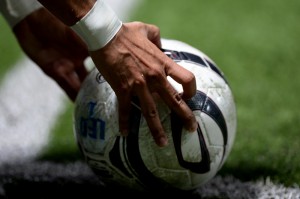 Hands Holding a soccer ball