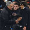 An image of football manager Antonio Conte shaking hands with Jose Murinho