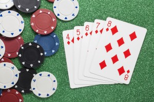 An image of poker cards and chips - Online Poker